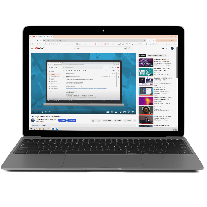 Laptop z otwartą stroną internetową, na której wyświetlana jest instrukcja obsługi Zooma.